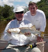 Rick with one of the many nice snook they caught in 2 days fishing. Snook Fishing Photo Gallery - Islamorada Fishing Charters
